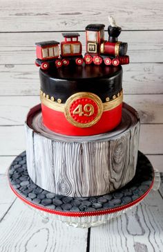 a birthday cake with a train on top