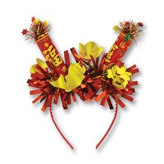 two candy sticks are wrapped in red and yellow paper with flowers on them, as if they were fireworks or firecrackers