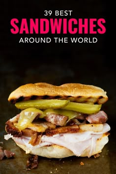 sandwich with pickles and bacon on it in front of the words, best sandwiches around the world