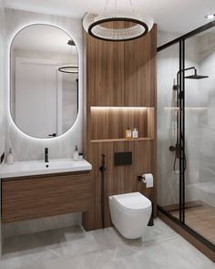 a bathroom with a toilet, sink and shower