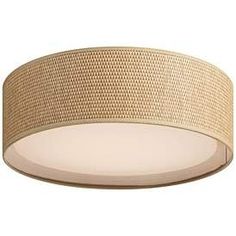 a round light fixture with woven fabric on the top and bottom, in an off white background