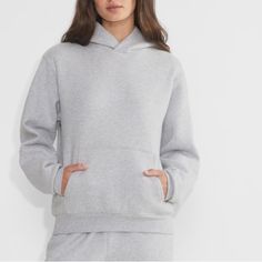 A Fan Favourite With A Reputation As The Hoodie Of All Hoodies, This Is A Pullover Sweatshirt With A Kanga Pocket, Dropped Shoulders And Ribbed Trim. It’s Made With Aritzia's Cozy Fleece Premium Midweight Fleece Famous For Its Soft-Brushed Back, Sueded Face And Cloud-Nine Plush Feel. The Best Kind Of Cozy. This Garment Has Been Perfected Season After Season For That Just-Right Fit And Feel. Faded Our Unique Wash Is Achieved Through A Special Technique Instead Of Dyeing The Fabric, We Dye The Fin Aritzia Grey Hoodie, Aritzia Tna Sweatsuit, Aritzia Tna Zip Up, Heather Grey Relaxed Fit Fleece Sweatshirt, Aritzia Tna Hoodie, Aritzia Sweater, Aritzia Tna, Cool Hoodies, Colorful Hoodies