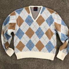 Vintage 1970s JCPENNEY argyle v-neck sweater  Reads L  Excellent vintage condition with no flaws found  Measurements taken laying flat  Pit to pit 21.5 Length 23.5  Great colorway  #argyle #vintage #1970s #grandpa #sweater Grandpa Sweater, Argyle Sweater, Toledo, V Neck Sweater, Vintage 1970s, Men's Sweater, Vneck Sweater, Neck Sweater, Sweater Outfits