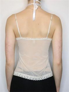 Age : 18-24

Style : Y2K

Pattern Type : Solid

Clothing Length : Regular

Decoration : Lace

Fabric Type : Broadcloth

Material : Cotton,Polyester,Spandex

Gender :Women

Item Type : Tops

Elasticity : Slight Strech Feminine White Camisole For Party, White Camisole For Spring Party, White Summer Party Camisole, White Spring Party Camisole, Sheer Fitted Sleeveless Tank Top, White Sleeveless Camisole For Party, White Spaghetti Strap Top For Party, White Spaghetti Straps Tops For Party, White Spaghetti Strap Party Tops