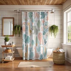 a bathroom with a shower curtain, rug and mirror in it's center area