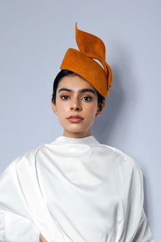 The Rosamel cocktail hat is made from velour felt and finished with a hand-formed leaf twist detail. This striking cocktail hat would be the ideal choice whether you are attending a garden party or cocktail soiree.  This is an ideal all-round special occasion hat and can be made in 50 colours.  Whether you are looking for a standout hat for the races, this modern and unique design is sure to compliment your ladies' day outfit. This hat is from the Trajectoria Collection, a millinery collection i Wedding Garden Party, Special Occasion Hats, Mother Of The Bride Hats, Formal Hat, Modern Hat, Statement Hat, Occasion Hats, Bride Hat, Cocktail Hat