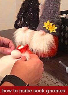 someone is making stuffed gnomes out of toilet paper and glue on their feet to make them look like they are wearing slippers