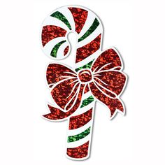 a christmas candy cane with a bow on it's side, cut out from paper