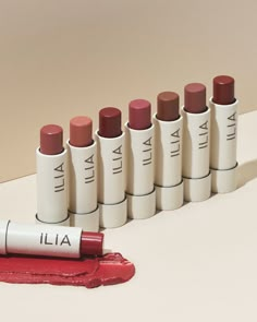 A clean, tinted lip balm with active levels of moisture-boosting ingredients and sheer, buildable color. Ilia Tinted Lip Balm, Matte Lip Balm, Lip Balm Packaging Ideas, Lip Balm Tinted, Cute Lip Balm, Best Lip Balms, Skin Lightening Diy, Lip Balm Packaging, Makeup Packaging