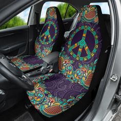 car seat covers with peace sign and flowers on them in front of the driver's door