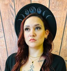 "Welcome to Witchwood's brand new hat line! These wide brim hats are made of sturdy vegan felt and are all hand printed.     Vegan Felt Size: 22.5\" (but size is adjustable and can be sized down, inside the hat) Brim - 2.5\" wide Hat Color - Black Print Color - Charcoal   Hats will ship in 7-10 business days from date of order" Fitted Black Witchy Hat, Black Fitted Witchy Hat, Black Brimmed Witchy Hat, Black Witchy Brimmed Hat, Black Fedora Felt Hat For Halloween, Witchy Hat With Curved Brim, Gothic Black Brimmed Hat, Black Witchy Hat With Curved Brim, Black Curved Brim Fedora For Halloween