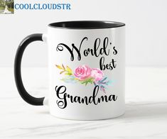 a black and white coffee mug with the words world's best grandma on it