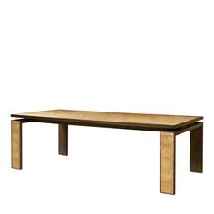 a wooden table sitting on top of a white floor