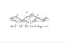 mountains with the words don't let the hard days win written in black ink