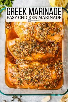 greek marinade in a glass casserole dish with lemons and herbs