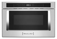 a stainless steel microwave oven with the door open