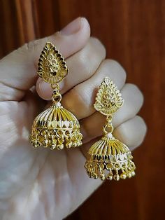 22k Real Dubai Gold Finish Small Dangling Jhumka Earrings.  *Simple - Lightweight- cute 😍, *Size:  Drop Length 4.3 Cm and umbrella jhumkas width each 2 Cm. * Best For everyday wear but maintain our jewelry Care guidelines. ●SAME Day Shipping if you place order between  1 am to 1 pm.  ● Ships Next working day from New York city with USPS standard 3-5 working day delivery service.  ● Free Shipping Over $35 Shopping. ● Everyday Wear Convince Earrings for Gold Lovers. ● Handmade and Finished Simple Jumki Gold, Small Jhumka Earrings, Small Jhumka, Jhumkas Gold, Little Hoop Earrings, Jumka Earrings, Dubai Gold Jewelry, Gold Jhumka, Kundan Bangles