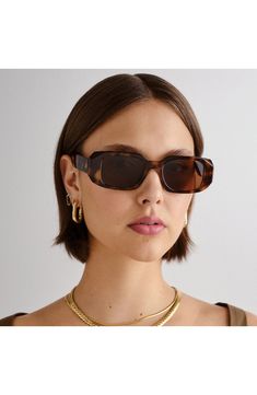 A slim rectangular silhouette adds a retro aesthetic to everyday sunnies with full-coverage UV protection. 49mm lens width; 16mm bridge width; 140mm temple length 100% UV protection Recycled polycarbonate Imported Random Wishlist, Everyday Sunglasses, Sustainable Sunglasses, 90s Sunglasses, Rectangular Sunglasses, Cool Sunglasses, Retro Aesthetic, Polarized Sunglasses, Tortoise