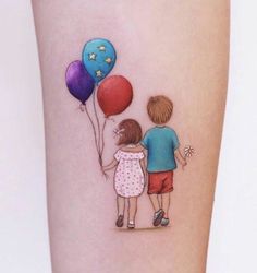 two children holding balloons tattoo on the leg