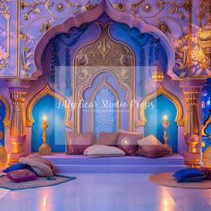 an elaborately decorated room with blue walls and gold accents