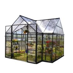 a green house with plants growing inside