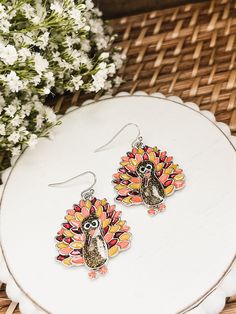 Get into the Thanksgiving spirit with our Adorable Turkey Earrings. The intricate design and unique fun colors create a festive and playful look, perfect for any holiday celebration. 1.75 inches Metal: Zinc Alloy, good for 99% of allergies including nickel Turkey Earrings, Wooden Turkey, Book Jewelry, Yellow Earrings, Holiday Jewelry, Wood Earrings, Leather Necklace, Intricate Design, Holiday Celebration