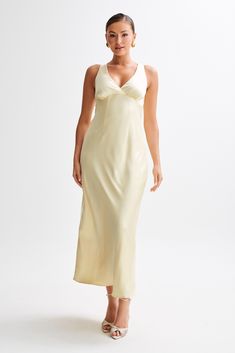 Classically chic.The MEGHAN Satin Maxi Dress epitomises timeless elegance and sophistication. Featuring a flattering V neckline and a discreet centre back invisible zip, this dress exudes understated charm and grace. Its maxi length adds a touch of allure, perfect for making a statement on any occasion. Enhanced with gathered under-bust detail, it ensures a flattering fit that complements your figure flawlessly. Lined for comfort, the Meghan dress is the epitome of effortless chic, allowing you Front Split Dress, Lemon Sorbet, Evening Outfit, Exude Confidence, Velvet Maxi Dress, Split Maxi Dress, Maxi Dress Online, Grad Dresses, Cute Clothes