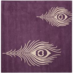 two purple rugs with white feathers on them and one has an eye in the middle