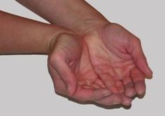 two hands reaching out towards each other