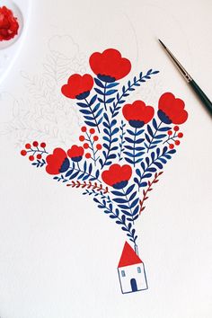 a painting with red and blue flowers on it next to a paintbrush, watercolor pencils and paper