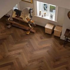 an overhead view of a room with wood flooring