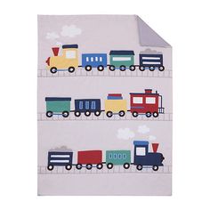 a wall hanging with trains and cars on it