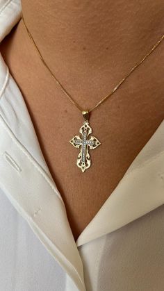 This exquisite 14K gold cross necklace features intricate and unique embellishments on the cross itself, showcasing a stunning design that stands out.  At the center of the cross, there is a captivating diamond cross, with the option to choose between sparkling white or bold black diamonds. The diamonds are natural, high-quality, and conflict-free, ensuring ethical sourcing. This distinctive cross is a one-of-a-kind piece, crafted in the Holy Land, making it a meaningful addition to any jewelry collection or a thoughtful gift for someone special. Designed as a unisex accessory, this 14K  Gold Pendant  embodies heritage and elegance, offering high-quality, meaningful jewelry for those who appreciate timeless sophistication.  Treat yourself or someone special to this meaningful accessory tod Cross Christian, Gold Cross Necklace, Gold Cross Pendant, Natural High, Meaningful Jewelry, Diamond Cross, Black Diamonds, Unisex Accessories, Holy Land