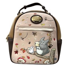 a small backpack with an image of a cat and dog sitting on a tree branch