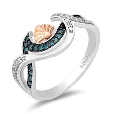 A captivating homage to the ocean's depths and the adventurous spirit that dwells within, this Ariel inspired ring is meticulously crafted with intertwined waves of white and blue diamonds. The white diamonds evoke the frothy crests, while the blue diamonds capture the serene depths, together creating a harmonious symphony of sea-inspired brilliance. Nestled between these waves lies a delicate rose gold seashell, a cherished emblem of Ariel's boundless curiosity and love for the sea. Its warm, i Ariel Jewelry, Ariel Seashell, Disney Princess Rings, Disney Princess Jewelry, Sea Ring, Sea Rings, Seashell Ring, Disney Rings, Ear Peircings