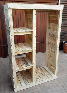 a wooden shelf sitting on top of a brick floor