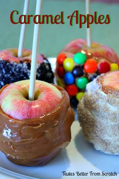 caramel apples on a plate with candy and candies