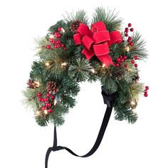 a christmas wreath with red bows and lights