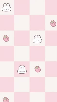 some pink and white squares with different animals on them, one has an apple in the middle