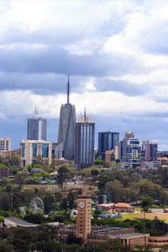 the city is surrounded by tall buildings and trees