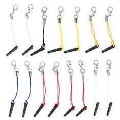 several different colored lanyards with black handles and hooks on each end, all lined up in rows