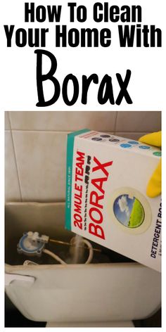 a box of borax sitting on top of a toilet next to a sink