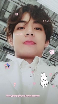 an image of a young man with pink lips and bunny ears on his face, looking at the camera