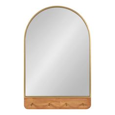 Enhance your cozy farmhouse home with the Schuyler mirror, a piece of wall decor that blends fashion and function within its robust design. This beautiful mirror features a two-tone natural wood and gold finish, creating a stylish look that fits into various color schemes throughout the home. The Schuyler is an arched mirror that features four wooden pegs. The metal frame is constructed from resilient iron, allowing it to last multiple years of high-quality display. This accent piece is fantasti Entry Wall Mirror, Wall Mirror With Hooks, Arch Wall Mirror, Bathroom Mirror Storage, Wood And Gold, Entry Wall, Arch Wall, Mirror With Hooks, Beautiful Mirror