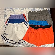 Bundle Of 9 Nike Shorts!! All With No Stains Or Rips. The 3 Grey Shorts, Blue And Pink, And Lsu Are Larges. The Red, White, And Blue Pair Are Mediums. And The Purple Pair Is A Small. Can Separate Them No Problem!!! Blue Pink Purple, Shorts Nike, No Problem, Shorts Athletic, Grey Shorts, Blue And Pink, Nike Shorts, The Purple, Athletic Shorts