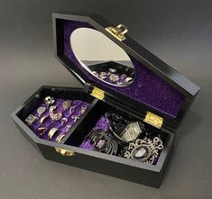 9 inch Coffin Jewelry Box, Velvet lined with mirror. This Coffin Jewelry Box can hold 10-to-18 rings, and has a 4 5/8'' x 2 3/4'' x 1 1/2'' cubby for miscellaneous pieces. Please select your velvet color: Red, Purple, Green, Pink, or Orange (Jewelry NOT included) Goth Jewelry Box Diy, Coffin Jewelry Box, Coffin Jewelry Box Diy, Goth Jewelry Box, Gothic Jewelry Box, 2000s Jewelry, Coffin Jewelry, Coffin Box, Orange Jewelry