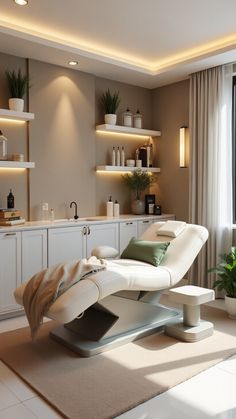 a white chair sitting in front of a window next to a potted plant on top of a table