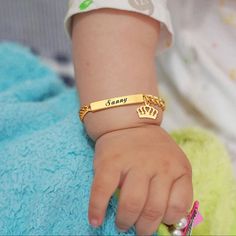 These bracelets are ion plated (IP) with 14K yellow gold on top of hypoallergenic stainless steel, and won't turn baby or reborn doll's skin, or vinyl, green. Click here for silver, here for rose gold. Limits: 2 lines maximum, 20 characters per line including spaces. When checking out, you will be able to leave me a note for the name you wish to have engraved. If you forget, no problem, just message me. Length: 12cm Imported with care from Singapore. Please allow 1 to 2 business days for process Baby Crown, Customised Bracelets, Kids Bracelets, Baby Bracelet, Gold Engraving, Engraved Bracelet, Id Bracelets, Name Bracelet, Baby Name