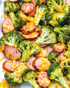 broccoli, sausage and cheese casserole in a baking pan with parchment paper