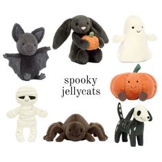 various halloween stuffed animals are arranged in a circle